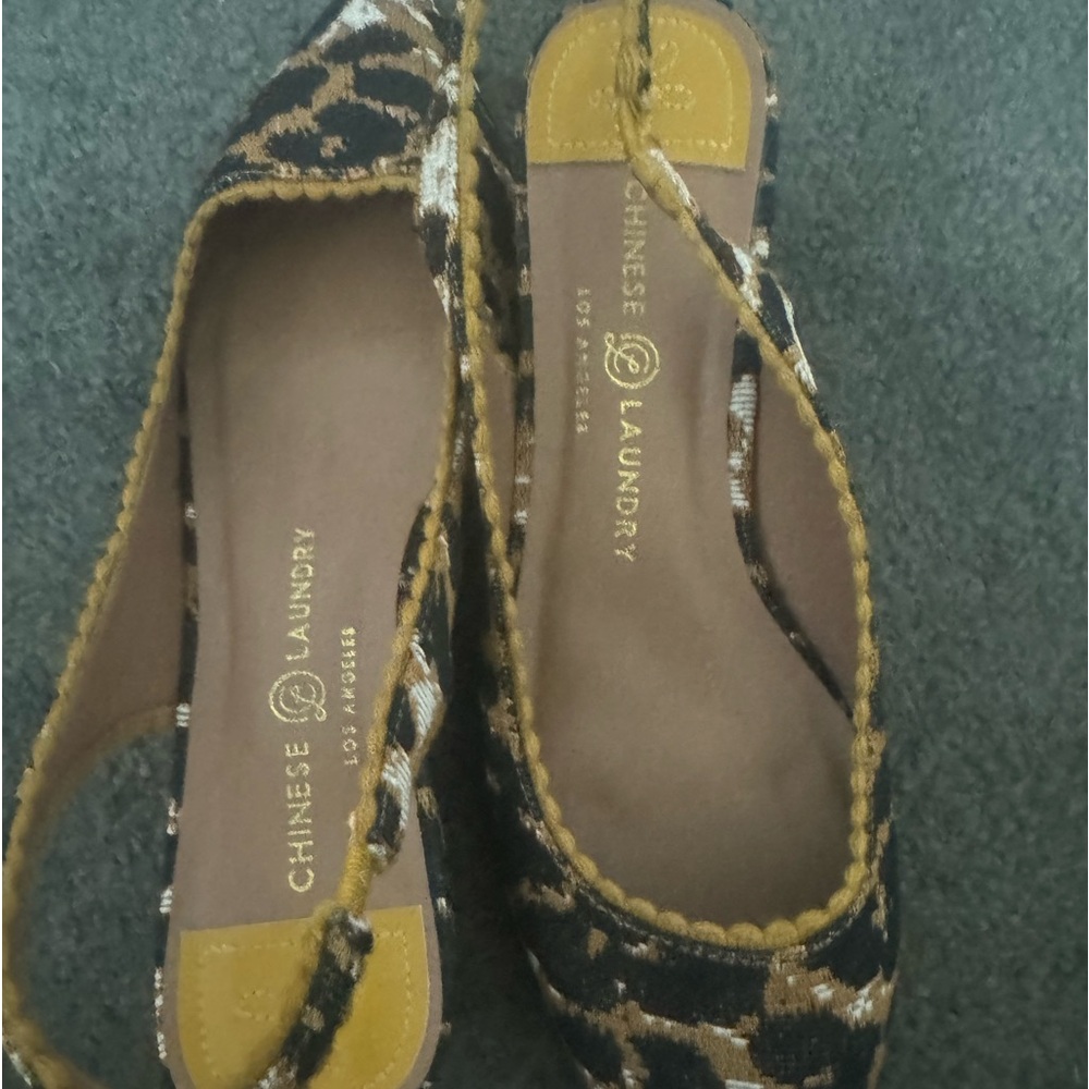 Worn once leopard pattern shoe